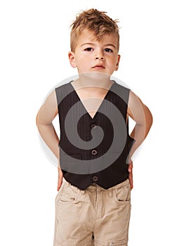 Acting with attitude. A cute little boy posing on a white background.
