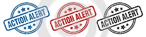 action alert stamp. action alert round isolated sign.