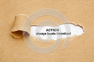 Action Always Beats Intention Torn Paper Concept photo
