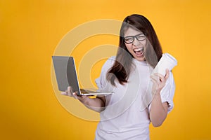 Action beautiful young girl on yellow background