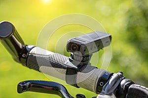 action camera on a bike. Mini video camera registrar photo