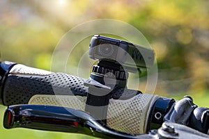 action camera on a bike. Mini video camera registrar photo