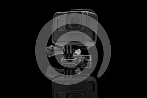 Action camera isolated on black background
