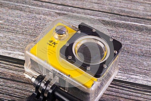 action camera on wooden table