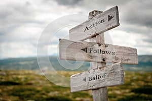 action follows belief signpost outdoors