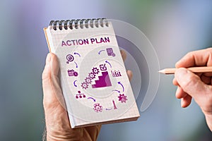 Action plan concept on a notepad