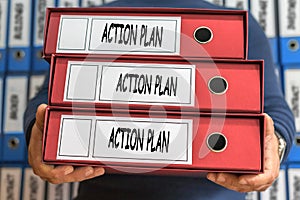 Action plan concept words. Folder concept. Ring binders.