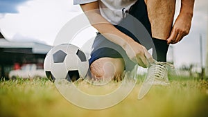 Action sport outdoors of a group of kids having fun playing soccer football for exercise