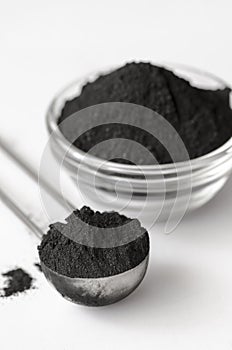 Activated charcoal powder photo