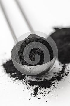 Activated charcoal powder photo