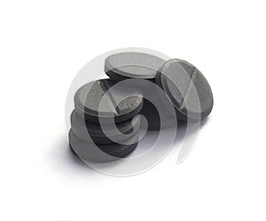 Activated coal isolated on white photo