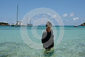 Active Senior Woman Standing in Tropical Bay photo