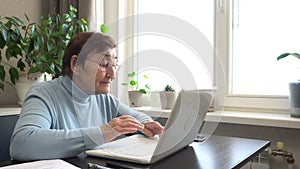 Active Aging: Grandmother Masters Computer Skills at Home