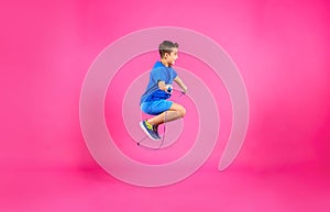 Active boy jumping rope