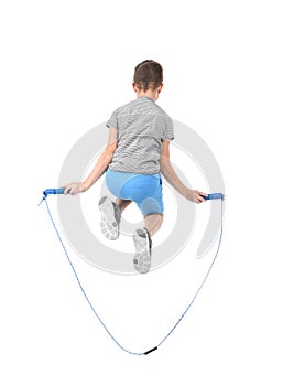 Active boy jumping rope