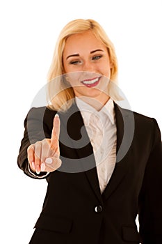 active business woman pressing a virtual button isolated over white background