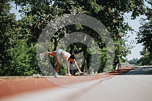 Active Caucasian sports girl competes in cartwheeling outdoors showcasing her fit bodies and training her muscles in the