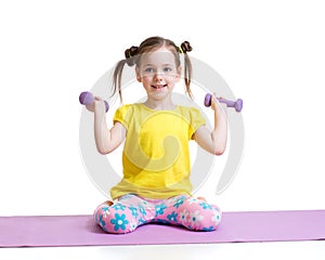 Active child exercising isolated on white photo