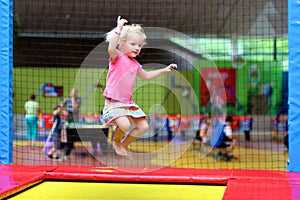 Active child jumping on the trampoline
