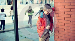 Children playing hide and seek in the schoolyard photo