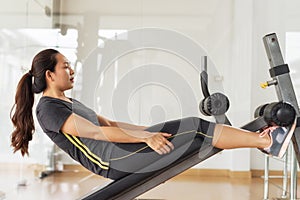 Active Chinese woman sit up exercise