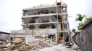 Active construction site of a multi-story building with workers.