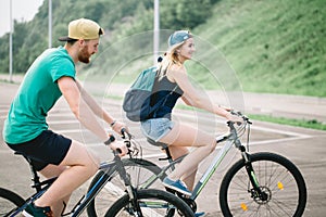 Active couple on a bike ride in the countryside on a sunny day