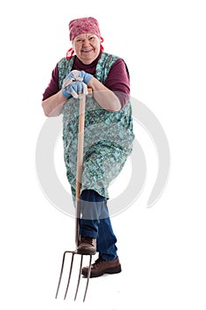 Active elderly woman holding pitchfork 3