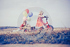 Active family leisure with kids. Cute toddler girl and boy working on farm outdoors. Eco resort child activities. Happy photo