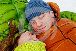 Active family walking in the winter forest.