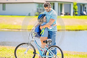 active father setting a example for fathers son. fathers parenting with son outdoor. childhood of son supported by