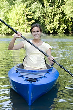 Active female in Kayak