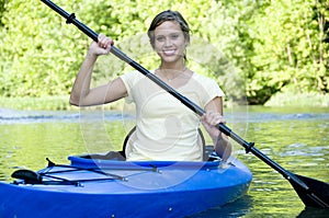 Active female in Kayak