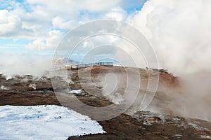 Active geothermal area Gunnuhver and lighthouse at winter, Reykjanes Peninsula, Iceland