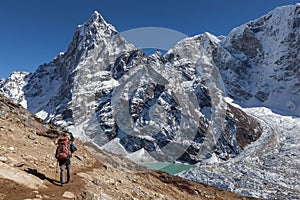 Active hiker trekking in Nepal towards a hight.