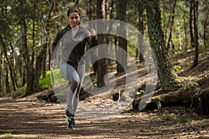 Active jogger running in nature