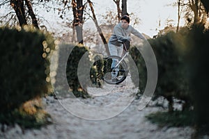 Active lifestyle captured with a man enjoying a bicycle ride in a scenic park