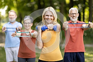 Active Lifestyle. Group of healthy senior people in sportswear training outdoors together