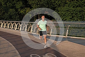 active man runner running in sportswear outdoor