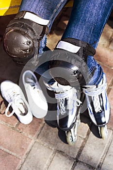 Active rest for children in the summer. Roller skating in the park