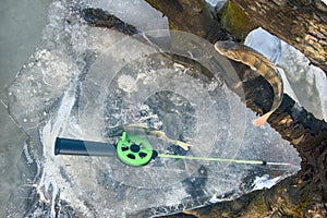 Active rest fishing for perch in winter from ice