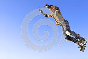 Active roller boy jumping