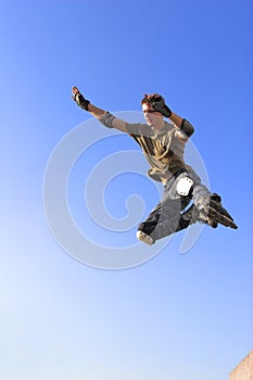 Active roller boy jumping