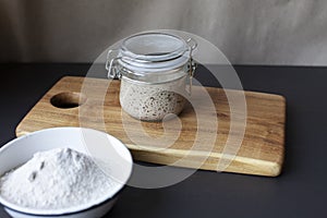 Active rye sourdough starter in a glass jar