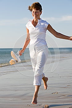 Active senior at the beach