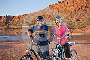 Active Senior Couple enjoying a bike ride together