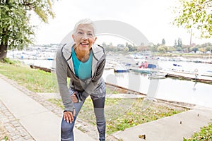 Active Senior Woman Doing Fitness Exercise