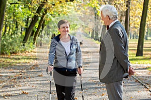 Active senior woman nordic walking