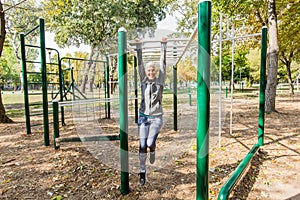 Active Senior Woman Practicing At Public Sports Park