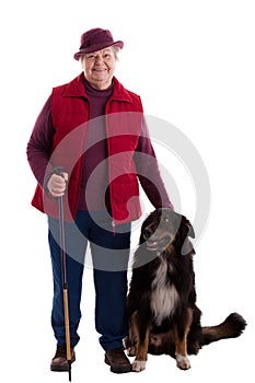 Active Senior Woman with walking stick and dog